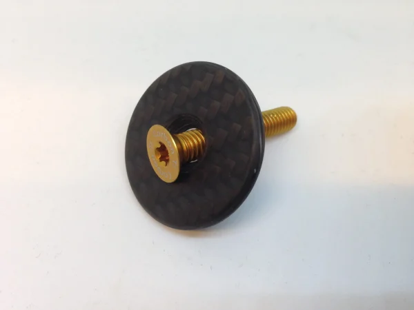 Carbon Ti X-Cap Carbon Matte Mit Aluminiumschraube Gold günstig online 1